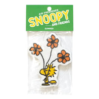 Snoopy-themed air freshener with flowers in packaging on a white background