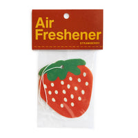 Strawberry-shaped air freshener with a red label on a white background