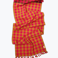 pink, ochre yellow and brown gingham plaid table runner.