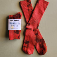tie dyed socks in saturated tones of red.
