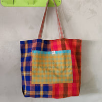 Mixed plaid fabric tote bag.