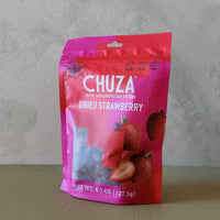 Packaged dried strawberry product with 'CHUZA' branding on a neutral background