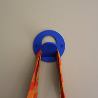 a matte bright blue modern wall hook
