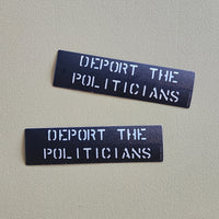 Two black patches with white text on a gray background