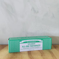 A 5oz tube of Dr Bronner's Spearmint toothpaste.