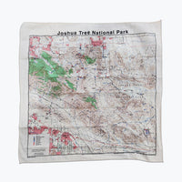 A cotton bandana with a topographical map of Joshua Tree National Park printed on it.