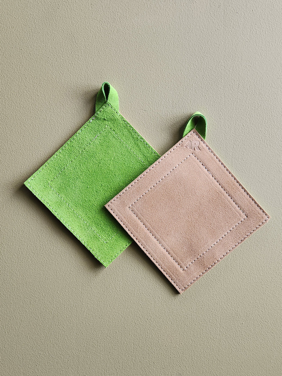 Bright green and tan suede leather square potholder.