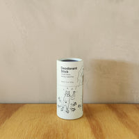 A natural, vanilla scented deodorant stick in a cardboard tube.