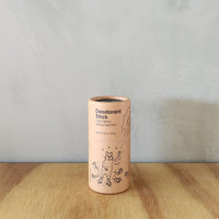 A natural deodorant in a cardboard tube with Cedar scent.