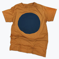 Ochre yellow t-shirt with large dark blue circle screen printed on the front.