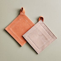Orange and tan suede leather potholder