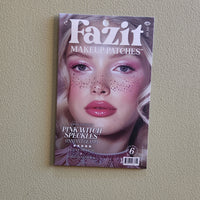 Fazit makeup patches packaging with a model wearing pink witch speckles on a beige wall.