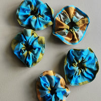 Turquoise, yellow and green plaid cotton scrunchie.