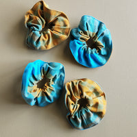 Turquoise and yellow plaid cotton scrunchie.