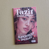 Fazit Superfruit Speckles makeup patches packaging on a beige wall