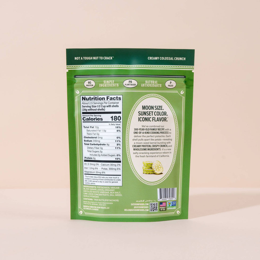 Green snack package with nutrition label on a beige background