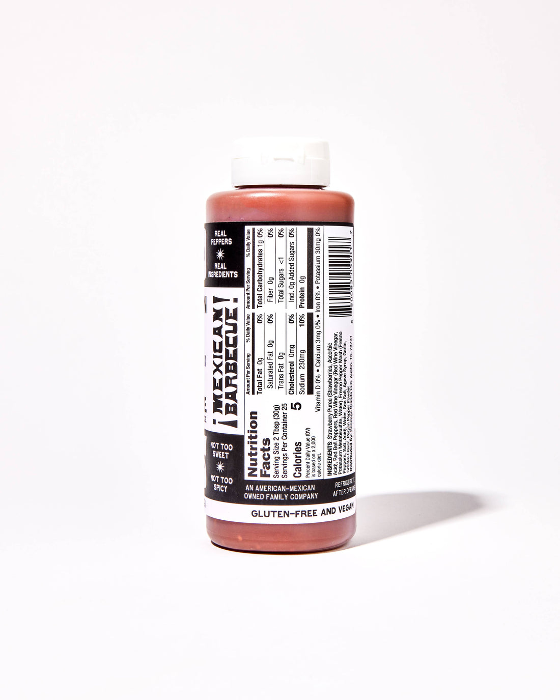 A bottle of Mexican Hot Sauce showing the back label with nutritional information and a white cap, set against a plain white background.