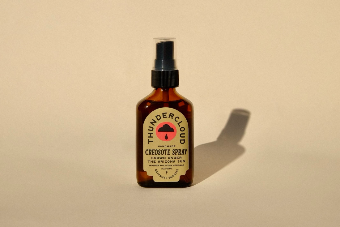 Bottle of Thundercloud Cerebone Spray on a beige background