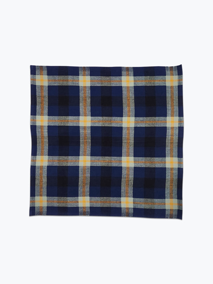 Plaid napkin in deep blue, navy and sage green.