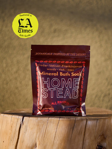 Mineral bath soap package on a wooden surface with 'LA Times' gift guide badge.