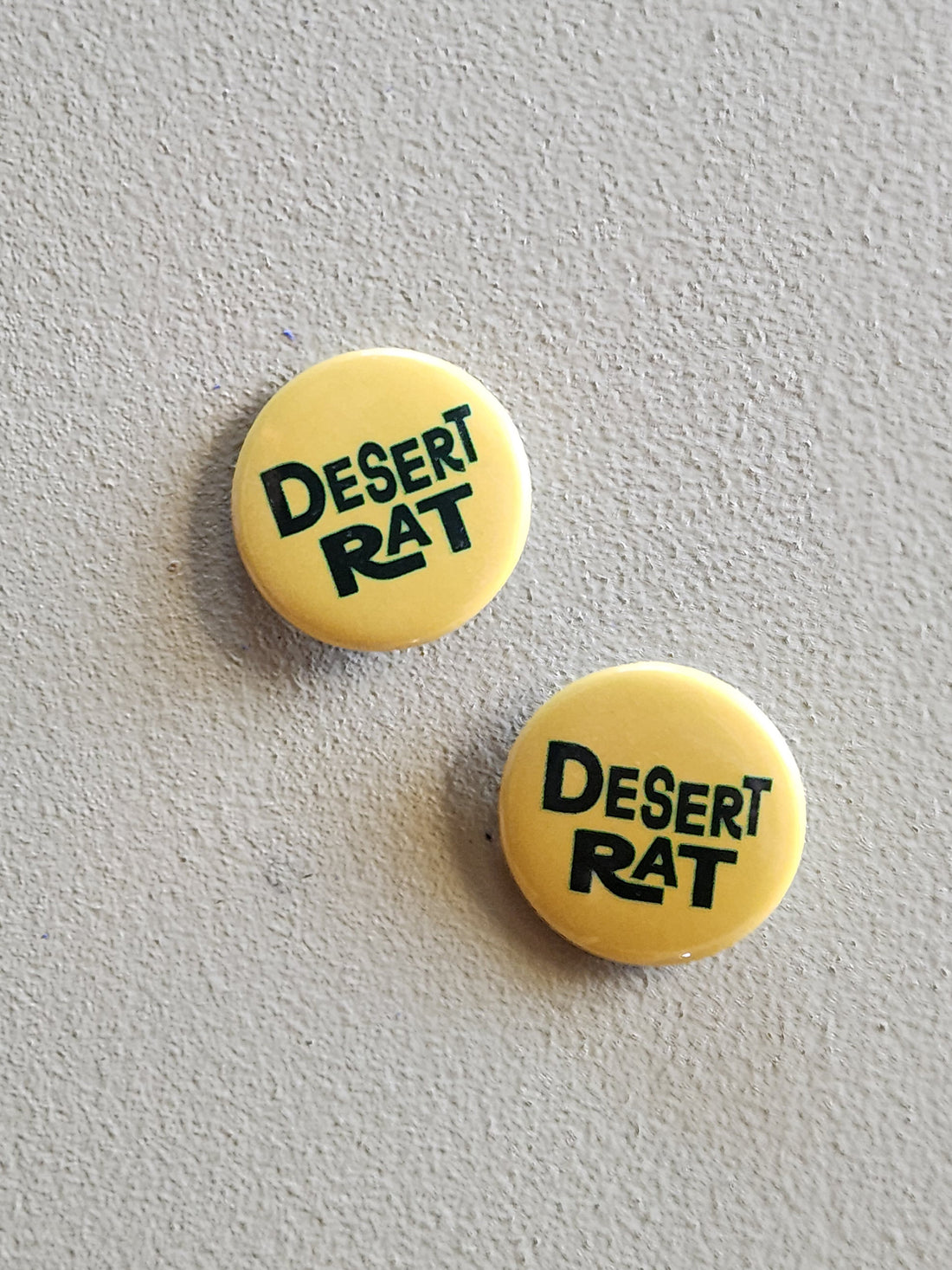 Two yellow buttons with &