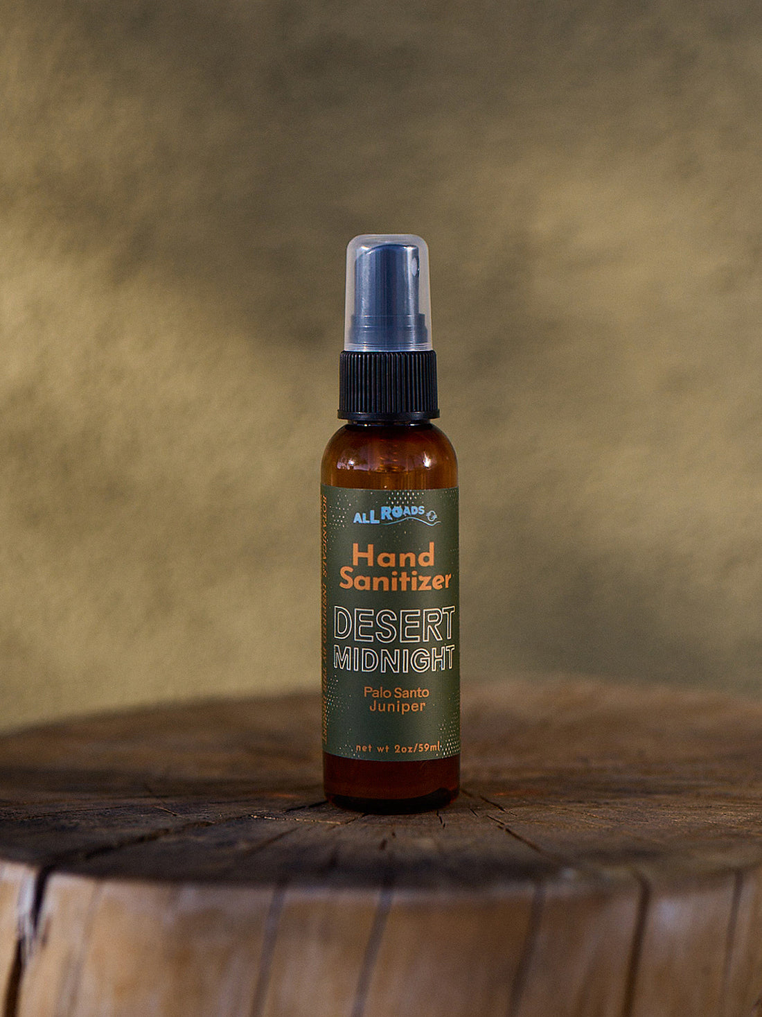 Hand sanitizer bottle labeled &