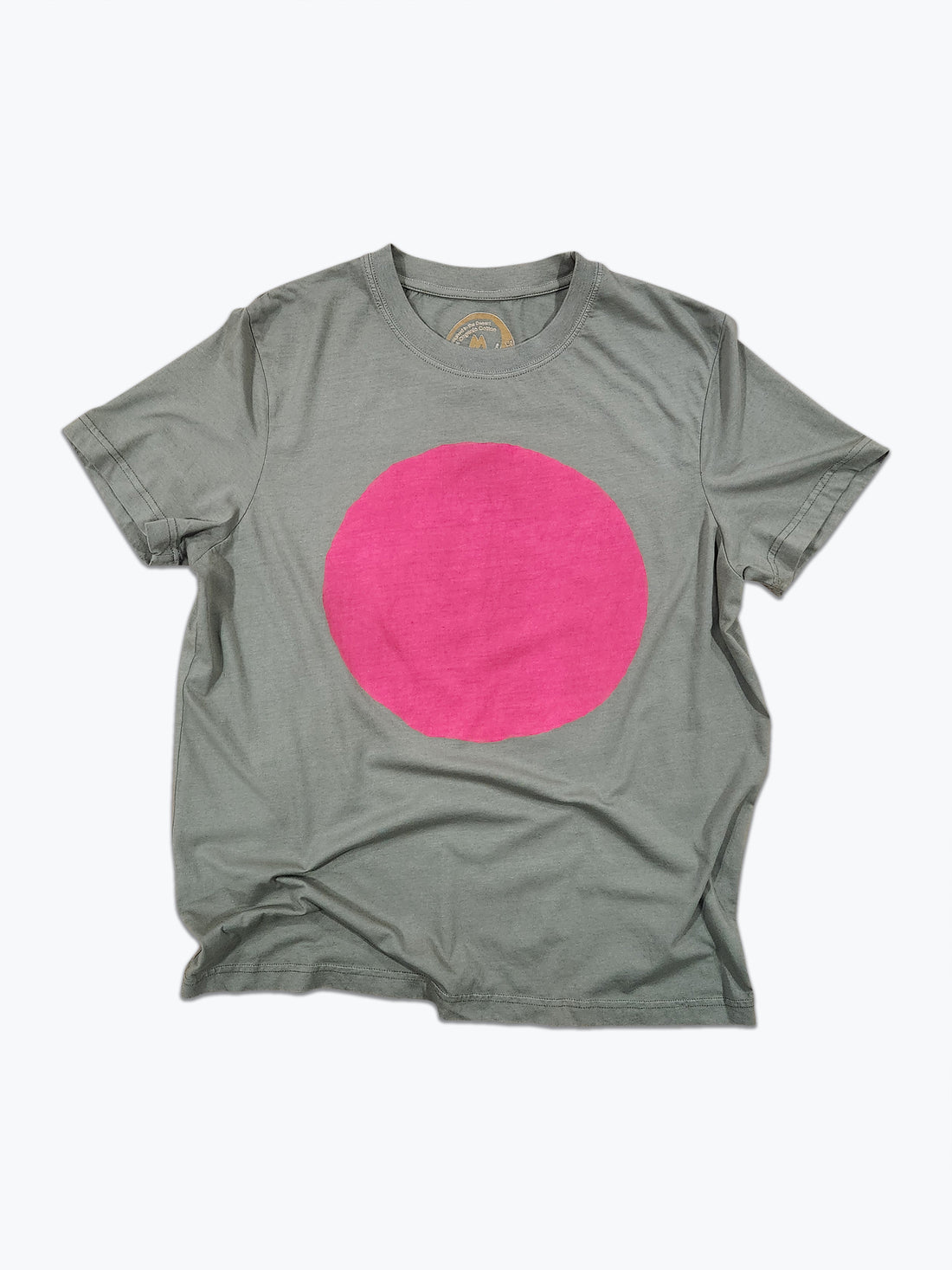 Green t-shirt with a pink circle design on a white background