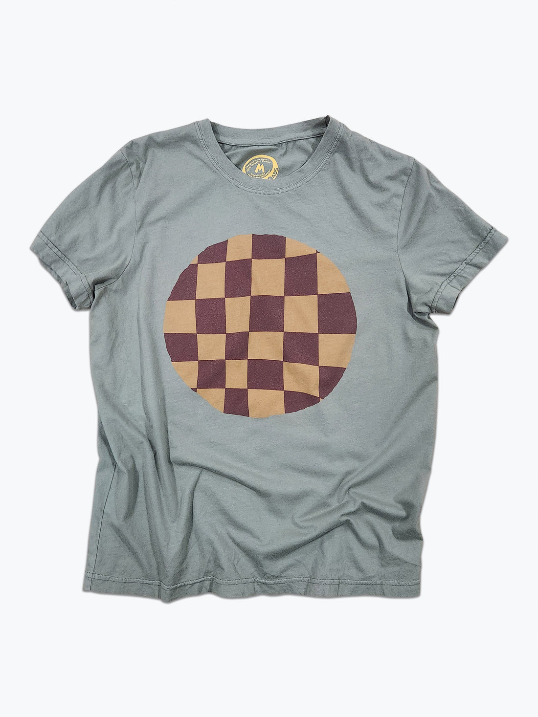 Gray t-shirt with a round checkered design in dark red and mustard on a white background