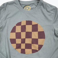 Gray t-shirt with a large brown and red checkered circle design on a white background