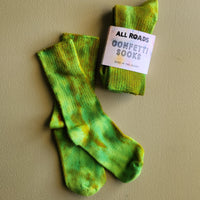 Bright green tie dyed socks. 