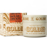 Goldie hair care product packaging on a white background