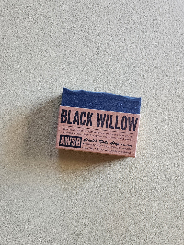 Small rectangular bar of soap with 'Black Willow' branding on a light gray background