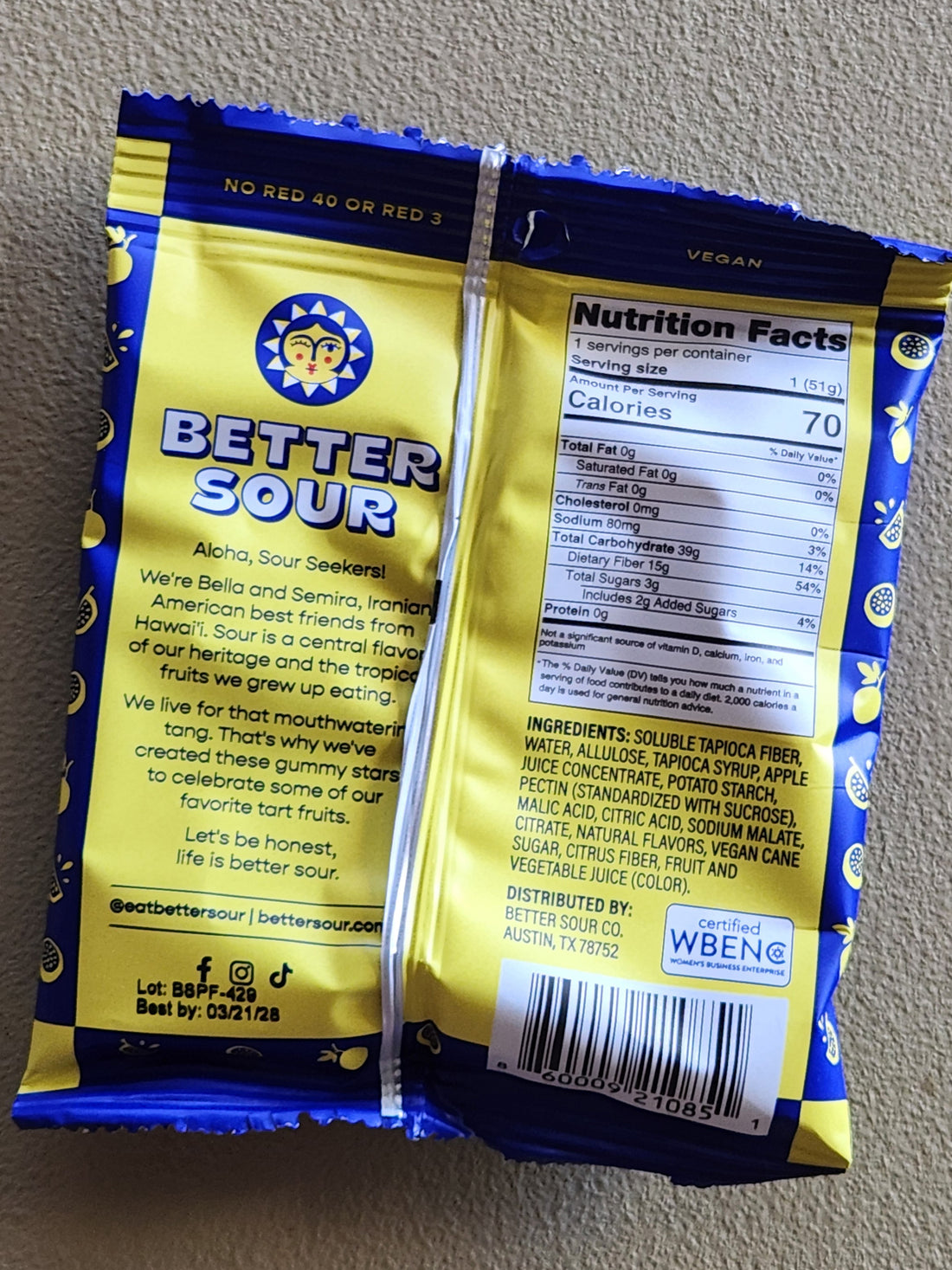 The back of a Better Sour snack bag, showing the nutrition facts panel, ingredients list, and branding on a beige background.