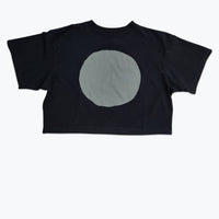 Boxy cropped t-shirt dyed black with a large grey circle screen printed.