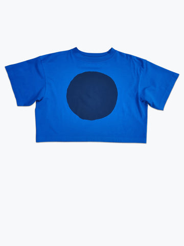 Boxy cropped t-shirt dyed bright blue with a large navy blue circle screen printed.