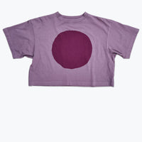Boxy cropped t-shirt dyed dusty lavender with a large purple circle screen printed on the front.