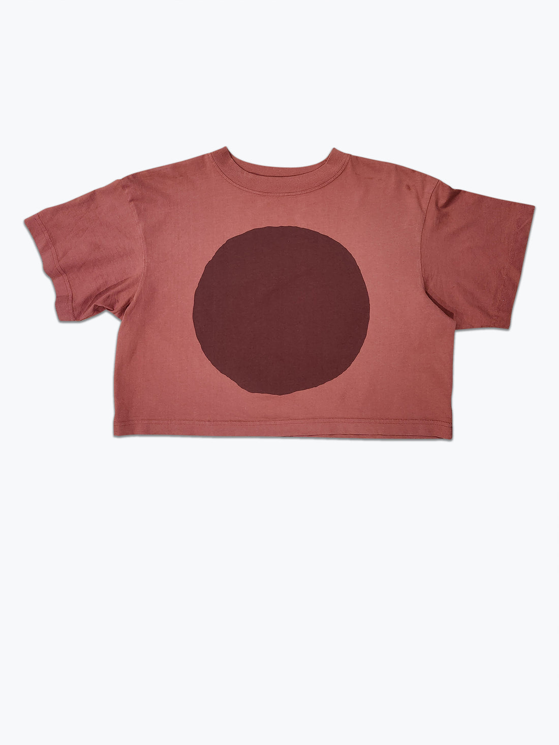 Brown t-shirt with a large brown circle on a white background