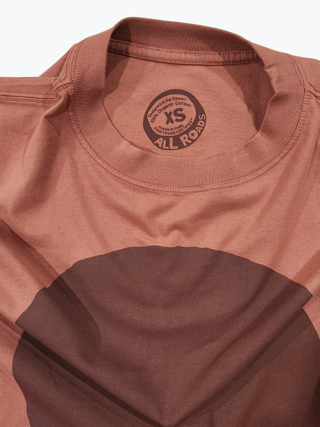 Brown shirt with a logo on the chest area against a white background