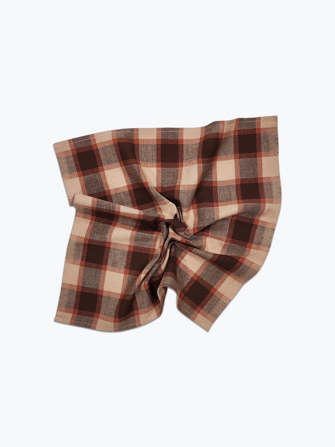 Plaid fabric with a brown and beige pattern on a white background