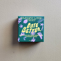 A box of Medjool dates stuffed with creamy cashew butter topped with lime zest.