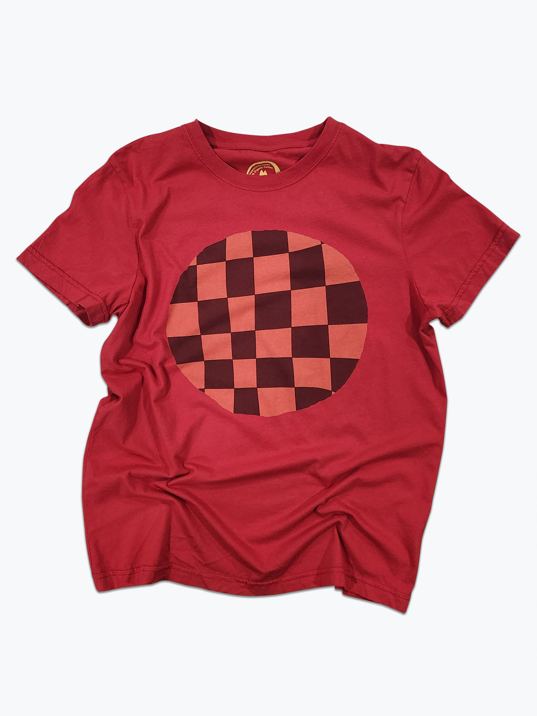 Red t-shirt with a brown checkered circle design on a white background