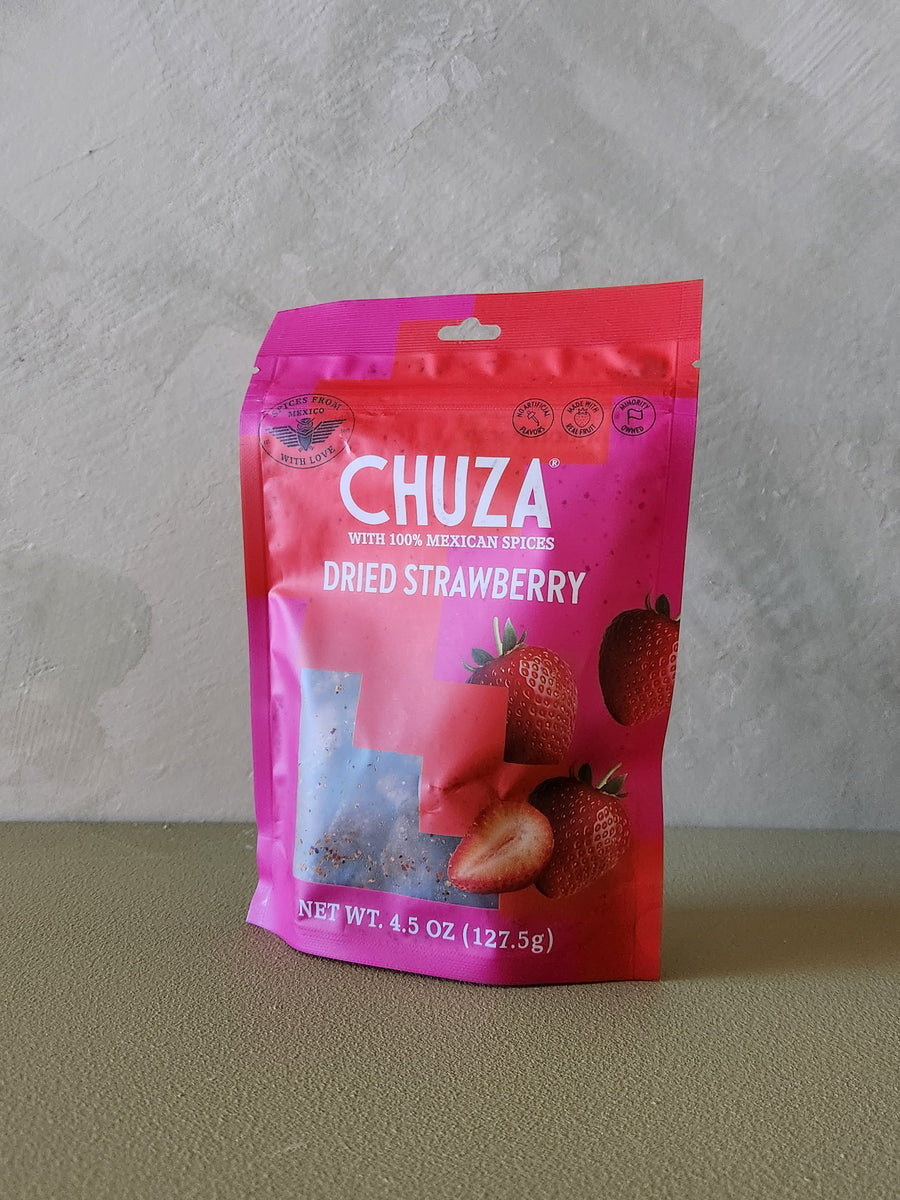 Packaged dried strawberry product with 'CHUZA' branding on a neutral background
