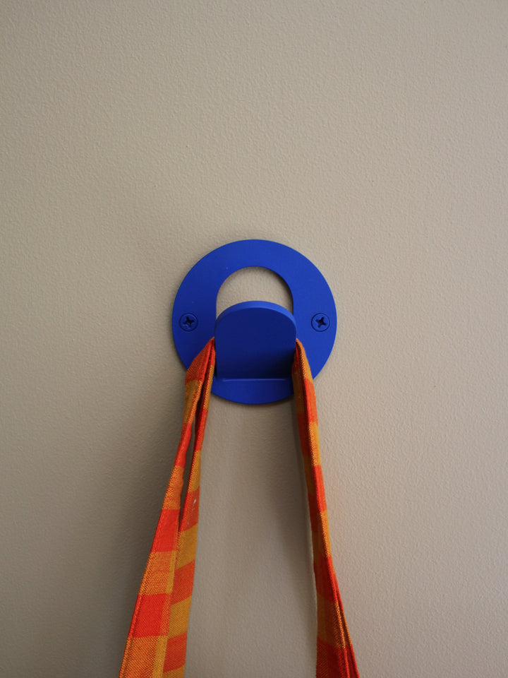 a matte bright blue modern wall hook