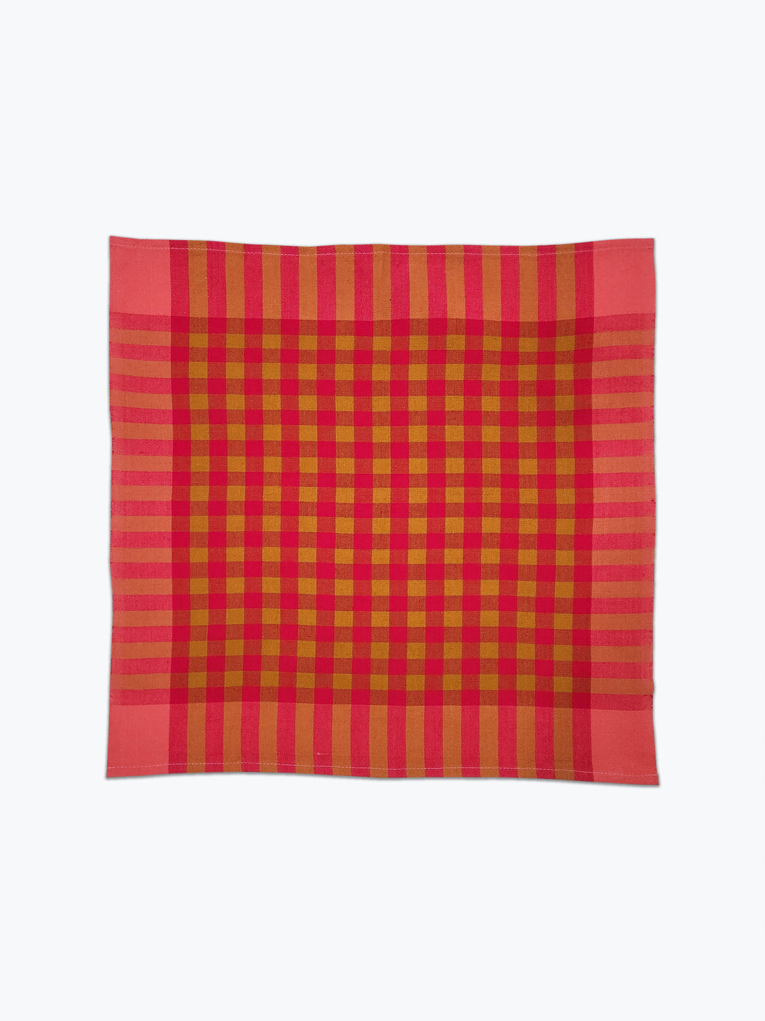 Coral pink and ochre plaid cotton fabric napkins.