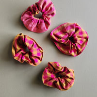 Pink and ochre yellow gingham cotton scrunchie.