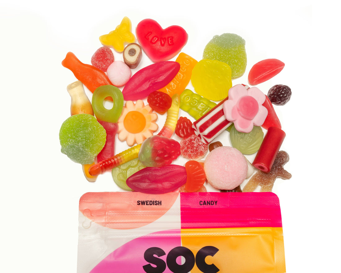 Assorted colorful candies with a &