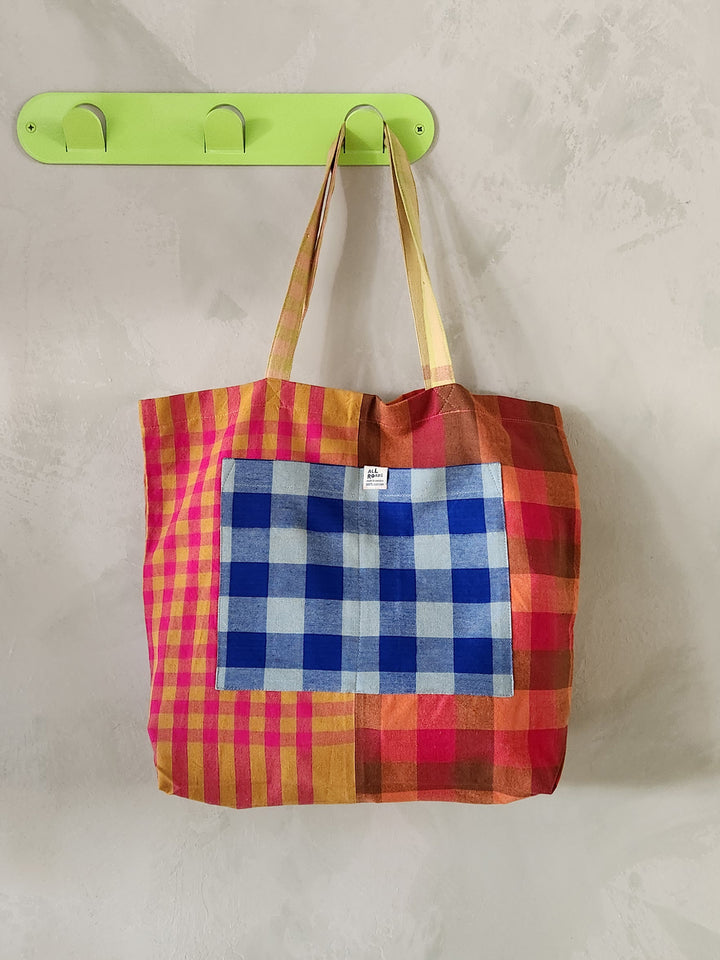 Mixed plaid tote bag.