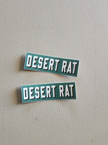 Two 'DESERT RAT' emblems on a gray background