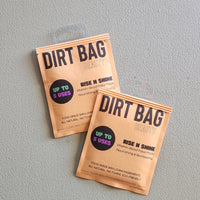 Two 'Dirt Bag' packaging on a gray background