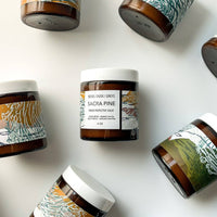 Jars with decorative labels on a white background